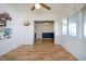 Bright dining room boasts wood-look floors, neutral walls and a large window perfect for entertaining or relaxed meals at 1315 Bottlebrush Dr, Bradenton, FL 34208