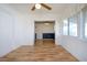 Bright dining room boasts wood-look floors, neutral walls and a large window perfect for entertaining or relaxed meals at 1315 Bottlebrush Dr, Bradenton, FL 34208