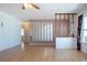 Spacious living room featuring a ceiling fan and flooring at 1315 Bottlebrush Dr, Bradenton, FL 34208