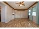 This living room includes built-in bookshelves and storage, allowing for a clean and stylish space at 1315 Bottlebrush Dr, Bradenton, FL 34208