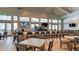 Community bar area with many seats, TVs, and well stocked shelves at 15332 Serene Shores Loop St, Bradenton, FL 34211