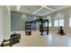Bright gym area equipped with free weights, cable machine and fitness equipment at 15332 Serene Shores Loop St, Bradenton, FL 34211