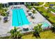 Aerial view of a long pool with lap lanes and a hot tub at 15332 Serene Shores Loop St, Bradenton, FL 34211