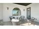 Relaxing outdoor seating area with stylish decor and a serene view at 1540 Hillview Dr, Sarasota, FL 34239