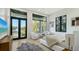 Inviting bedroom with waterfront views, stylish furnishings, and large windows showcasing the scenic surroundings at 1540 Hillview Dr, Sarasota, FL 34239