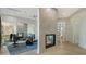 Bright home gym featuring a fireplace, mirrors and modern exercise equipment for a complete fitness experience at 1540 Hillview Dr, Sarasota, FL 34239