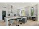 Modern kitchen featuring stainless steel appliances, a large island, and ample counter space at 1540 Hillview Dr, Sarasota, FL 34239