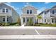 Charming two-story home with manicured front yard and a welcoming entrance at 164 Eagleston Ln, Sarasota, FL 34240