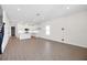 Open layout showcasing kitchen, dining area, and living space with ample natural light at 164 Eagleston Ln, Sarasota, FL 34240