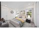 Inviting main bedroom with neutral tones, bedside tables, and ample natural light at 164 Eagleston Ln, Sarasota, FL 34240