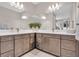 A well-lit bathroom features double sinks, spacious cabinets, and large mirrors, offering a functional and stylish space at 17502 Savory Mist Cir, Bradenton, FL 34211