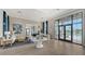 Clubhouse lounge area with designer furniture, modern decor, and access to the community pool at 17502 Savory Mist Cir, Bradenton, FL 34211