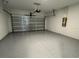 Epoxy floor in spacious two-car garage with automatic door and plenty of room for storage at 18044 Cherished Loop, Bradenton, FL 34211