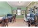 Bright office space with two desk areas, each featuring ample storage and modern computer setups at 19921 Petrino St, Venice, FL 34293