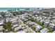 Aerial view showing homes near businesses and the beach, all near the ocean at 214 Palm Ave, Anna Maria, FL 34216