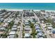 Stunning aerial shot of homes near beach and commercial area, all a short distance from the ocean at 214 Palm Ave, Anna Maria, FL 34216