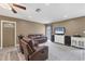 Inviting living room featuring neutral walls and a view to the yard at 22209 Breezeswept Ave, Port Charlotte, FL 33952