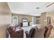 Open-concept living room with comfortable seating and neutral decor at 22209 Breezeswept Ave, Port Charlotte, FL 33952