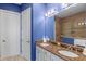 Bathroom with double sinks and granite countertops and a tiled shower at 319 Compass Point Dr # 201, Bradenton, FL 34209