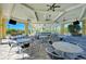 Spacious clubhouse interior with tables, chairs, and fans, ideal for gatherings and events at 319 Compass Point Dr # 201, Bradenton, FL 34209