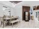Dining room features designer accents, stylish lighting, and wood-look floors at 319 Compass Point Dr # 201, Bradenton, FL 34209