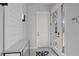 Light and airy entryway with shiplap wall, modern console table, and a glass-paneled door at 319 Compass Point Dr # 201, Bradenton, FL 34209