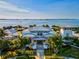 Stunning waterfront home with lush tropical landscaping and ample parking and serene water views at 319 Compass Point Dr # 201, Bradenton, FL 34209
