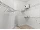 Bright walk-in closet with wire shelving and light wood-look floors at 319 Compass Point Dr # 201, Bradenton, FL 34209