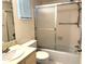 Cozy bathroom with tub and shower, vanity, and updated fixtures at 3321 Fuller St # 105, Sarasota, FL 34231