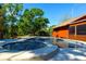 Enjoy a sparkling pool and hot tub with serene greenery, perfect for relaxation and recreation, right in your backyard at 3406 67Th Street E Ct, Bradenton, FL 34208