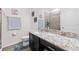 Bathroom with vanity, shower, and toilet at 3478 74Th Avenue E Cir, Sarasota, FL 34243