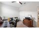 Bedroom with carpet floors, ceiling fan, sliding closet door, and sports themed furniture at 3478 74Th Avenue E Cir, Sarasota, FL 34243