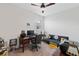 Bedroom featuring ceiling fan, window, carpet floors and furniture with a sports theme at 3478 74Th Avenue E Cir, Sarasota, FL 34243