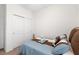 Bedroom with double closet, carpet, and neutral colors at 3478 74Th Avenue E Cir, Sarasota, FL 34243