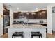 Gourmet kitchen with stainless steel appliances, granite countertops, and spacious center island at 3478 74Th Avenue E Cir, Sarasota, FL 34243