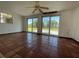 Sunroom featuring large windows, tile floors, and views of the outdoors at 3705 Chinaberry Rd, Bradenton, FL 34208