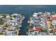 An aerial view of a waterfront property with a boat dock and canal access at 3716 Coconut Ter, Bradenton, FL 34210