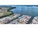 Aerial view of waterfront homes nestled within a tranquil canal community at 3716 Coconut Ter, Bradenton, FL 34210