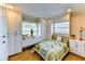 Cozy bedroom features built-in storage and a window seat for relaxing at 3716 Coconut Ter, Bradenton, FL 34210