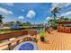 Relax on the spacious dock area with built-in seating and fire pit overlooking the calm waters at 3716 Coconut Ter, Bradenton, FL 34210