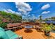Waterfront retreat featuring a fire pit and bench seating to enjoy panoramic views at 3716 Coconut Ter, Bradenton, FL 34210