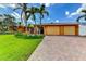 Charming single-story home with a beautiful garden and a two-car garage at 3716 Coconut Ter, Bradenton, FL 34210
