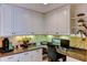 Home office space featuring built in cabinets, granite counters, and recessed lighting at 3716 Coconut Ter, Bradenton, FL 34210