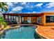 Enjoy the beautiful pool area with an attached spa and outdoor seating, perfect for relaxation and entertaining at 3716 Coconut Ter, Bradenton, FL 34210