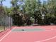 Well maintained community basketball court surrounded by greenery at 406 Petrel Trl, Bradenton, FL 34212