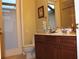 Bathroom featuring a stylish vanity with sleek fixtures, complementing the clean and functional layout at 406 Petrel Trl, Bradenton, FL 34212