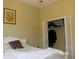 Comfortable bedroom with closet offering storage space and natural light at 406 Petrel Trl, Bradenton, FL 34212