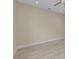 A bedroom with tiled floors, a ceiling fan, and baseboard at 4153 Camino Real, Sarasota, FL 34231