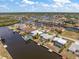 Aerial view of waterfront community with private docks and navigable canals at 4219 Eastlake Ct, Port Charlotte, FL 33948