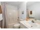 Bright bathroom with a shower/tub combo, a well-lit mirror, and ample vanity space at 4219 Eastlake Ct, Port Charlotte, FL 33948